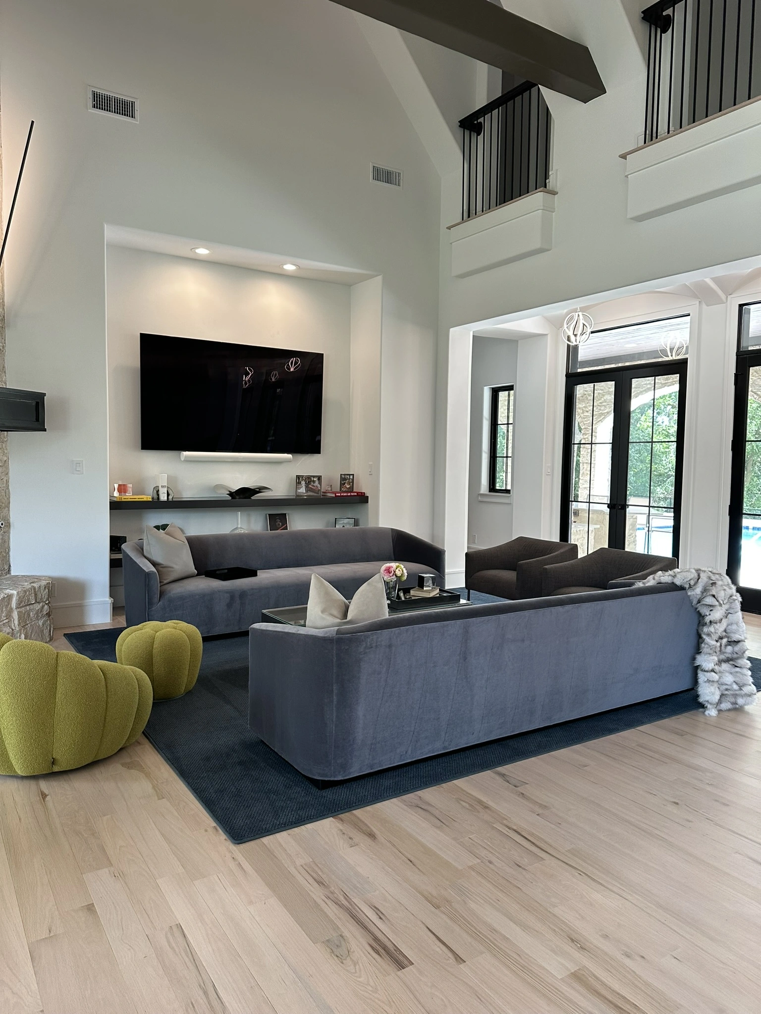 Living room remodel with new flooring by HT Contractors, Frisco, TX