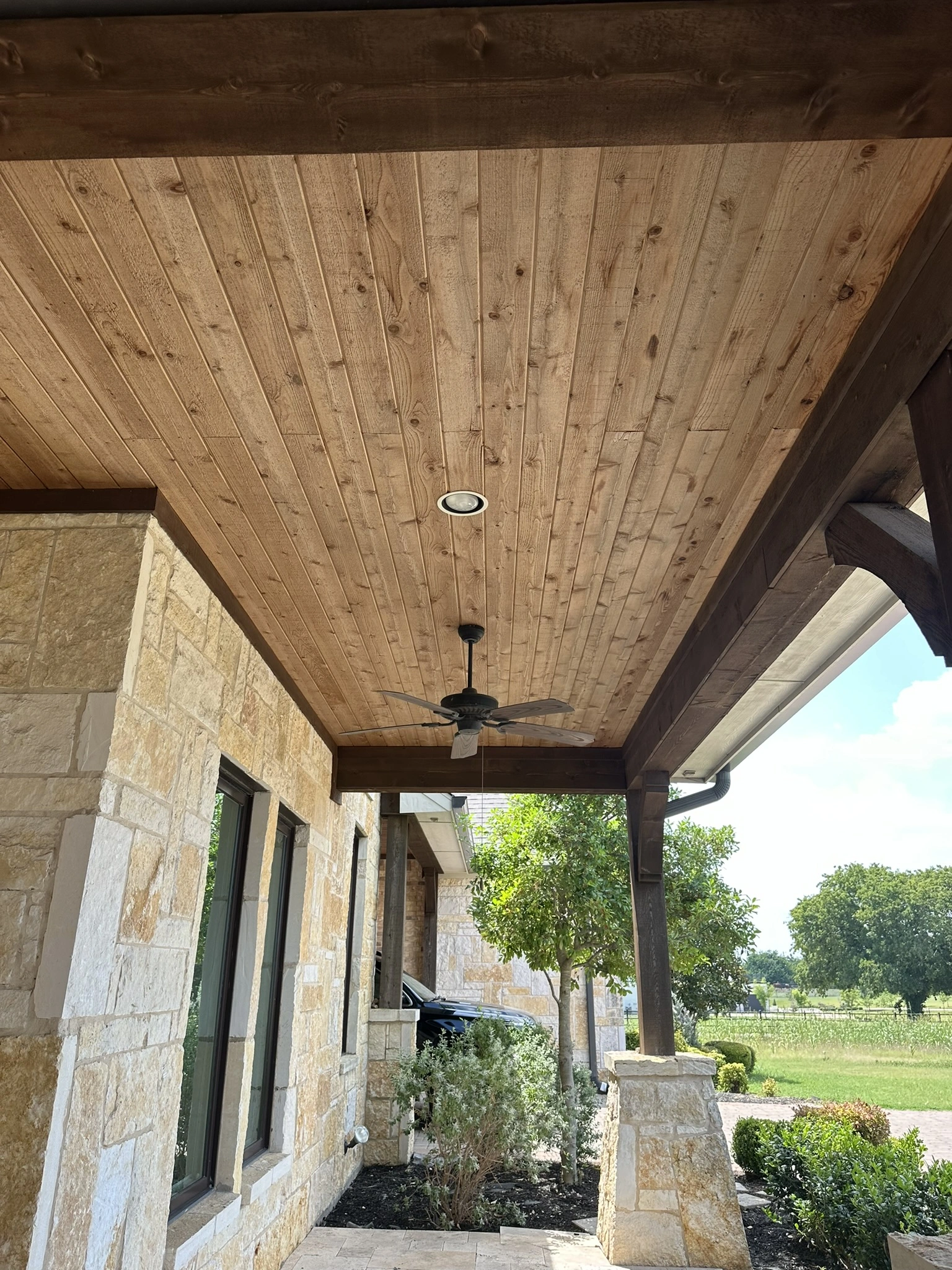 Stained wood finishing project by HT Contractors, Frisco, TX