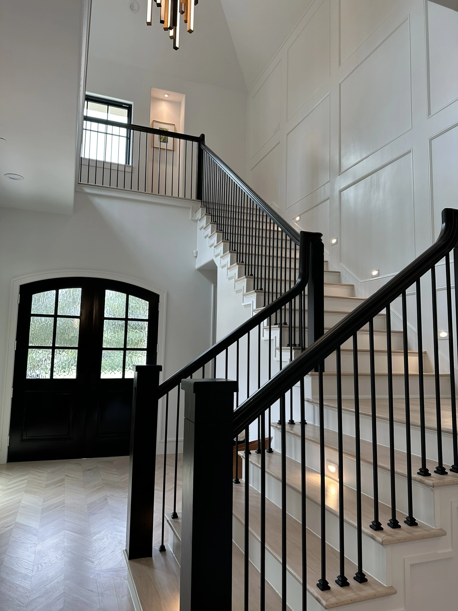 Basement finishing with custom stairs by HT Contractors, Frisco, TX