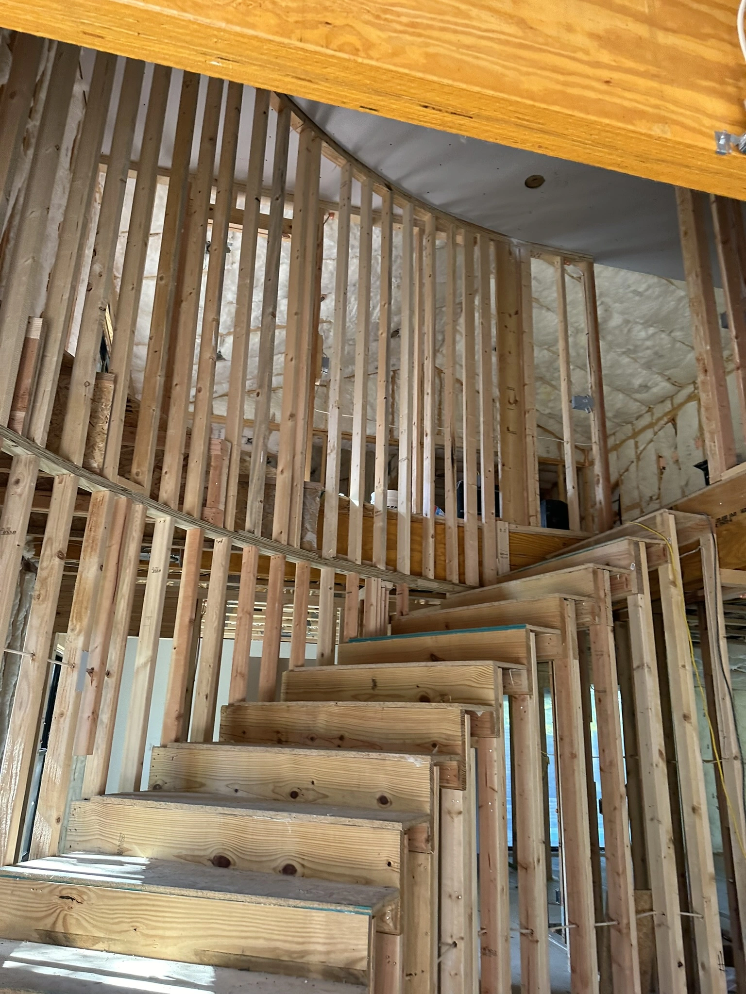 Custom staircase renovation by HT Contractors, Frisco, TX